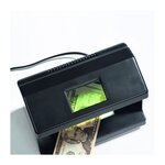 Multi testeur pour examiner timbres  monnaies  billets.