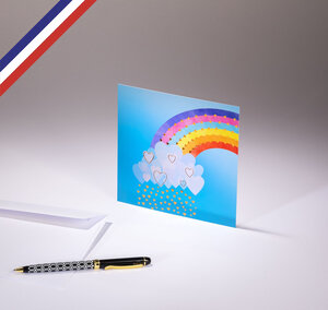 Carte simple all you need is love créée et imprimée en france sur papier certifié pefc - pluie de cœurs sous un arc-en-ciel