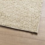 vidaXL Tapis shaggy à poils longs moderne doré 140x200 cm
