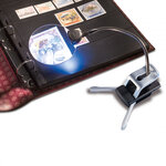 Loupe de bureau lumineuse avec bras flexible.