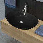 vidaXL Lavabo ovale en céramique noir avec trop plein 59 x 38 5 cm