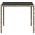 vidaXL Table de jardin avec dessus en verre gris clair résine tressée